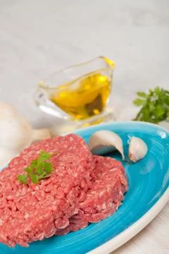 Raw hamburger Stock Photos
