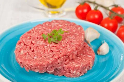 Raw hamburger Stock Photos