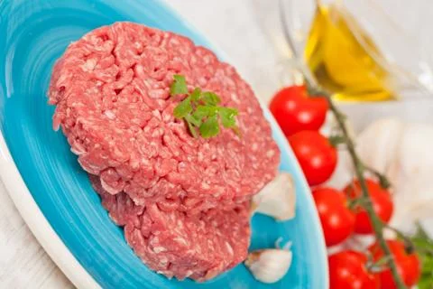 Raw hamburger Stock Photos