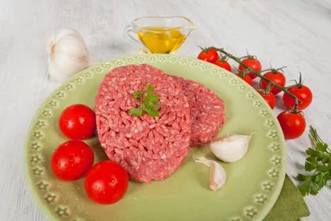 Raw hamburger Stock Photos