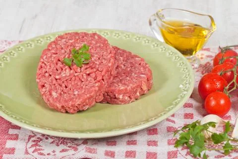 Raw hamburger Stock Photos