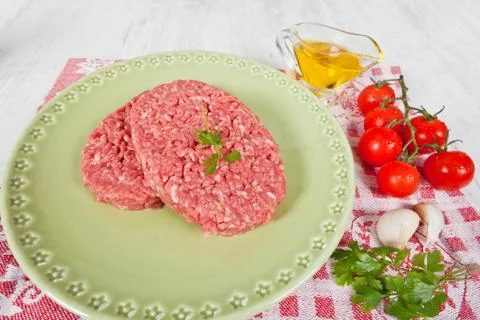 Raw hamburger Stock Photos