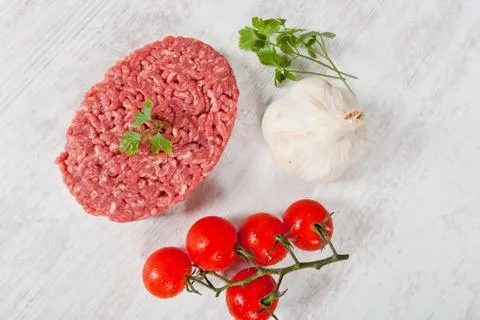 Raw hamburger Stock Photos