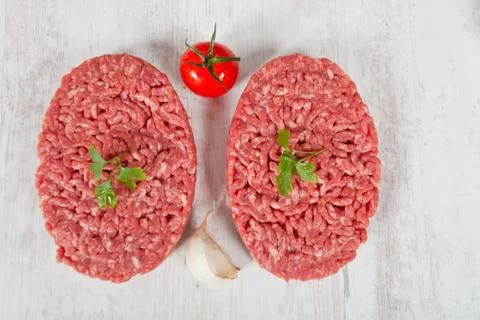 Raw hamburger Stock Photos