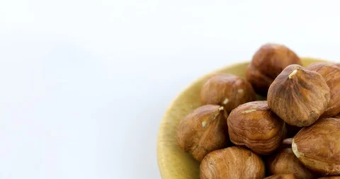 Raw hazelnuts isolated on white background Stock Footage 102809898