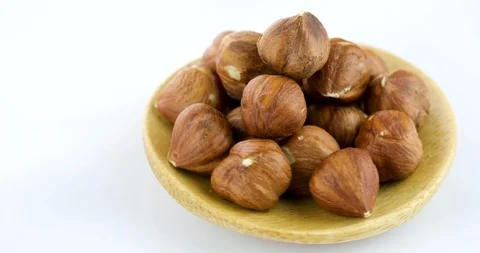 Raw hazelnuts isolated on white background Stock Footage 102810938