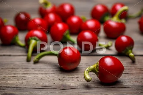 Raw hot cherry peppers Stock Photos