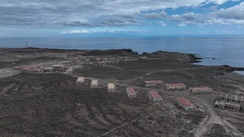 Raw House Ruins in Rustic Terrain with Coastal Backdrop – Abades, Tenerife Stock Footage 310064593