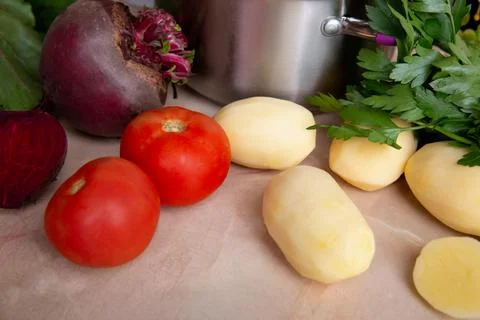 Raw ingredients for making red beet borscht. Stock Photos
