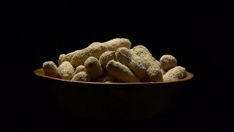 Raw Inshell Peanuts fried with salt.  Rotation. peanuts in shell. Stock Footage 102129512