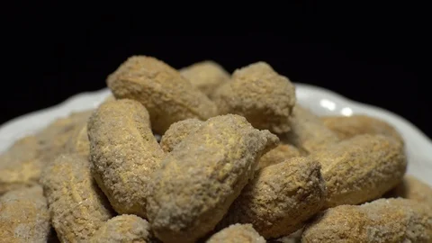 Raw Inshell Peanuts fried with salt.  Rotation. peanuts in shell. Stock Footage 102130611