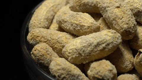 Raw Inshell Peanuts fried with salt.  Rotation. peanuts in shell. Stock Footage 102133454