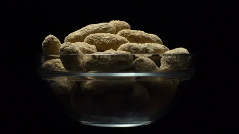 Raw Inshell Peanuts fried with salt.  Rotation. peanuts in shell. Stock Footage 102133809