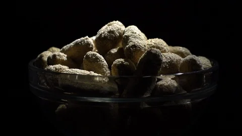 Raw Inshell Peanuts fried with salt.  Rotation. peanuts in shell. Stock Footage 102133901