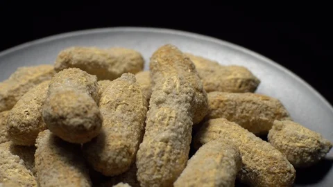 Raw Inshell Peanuts fried with salt.  Rotation. peanuts in shell. Stock Footage 102134787