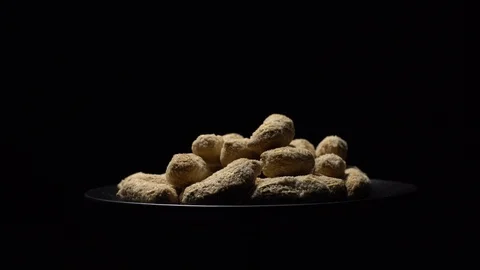 Raw Inshell Peanuts fried with salt.  Rotation. peanuts in shell. Stock Footage 102160962