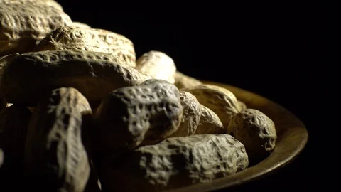 Raw Inshell Peanuts fried with salt.  Rotation. peanuts in shell. Stock Footage 102274477