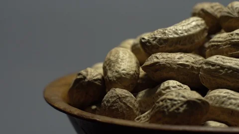 Raw Inshell Peanuts. Rotation. peanuts in shell. Snack closeup. Stock Footage 102270116