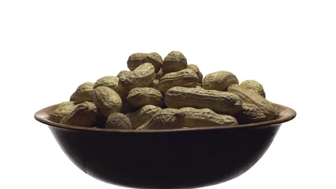 Raw Inshell Peanuts. Rotation. peanuts in shell. Snack closeup. Stock Footage 102270163