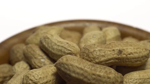 Raw Inshell Peanuts. Rotation. peanuts in shell. Snack closeup. Stock Footage 102273377