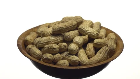 Raw Inshell Peanuts. Rotation. peanuts in shell. Snack closeup. Stock Footage 102273382