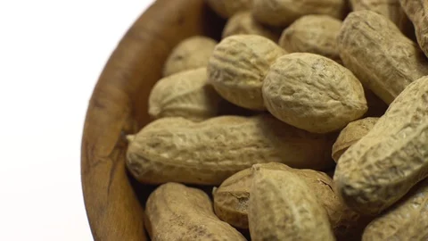 Raw Inshell Peanuts. Rotation. peanuts in shell. Snack closeup. Stock Footage 102274065