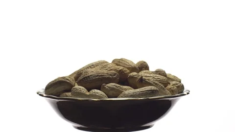 Raw Inshell Peanuts. Rotation. peanuts in shell. Snack closeup. Stock Footage 102278130