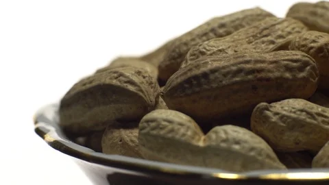 Raw Inshell Peanuts. Rotation. peanuts in shell. Snack closeup. Stock Footage 102279883