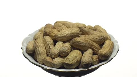 Raw Inshell Peanuts. Rotation. peanuts in shell. Snack closeup. Stock Footage 102280553