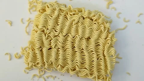 Raw instant noodles on white background Stock Footage 311846136
