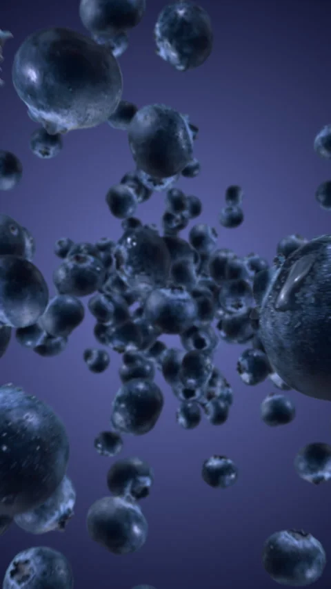 Raw juicy blueberries exploding and flying in super slow motion. Blueberry drops Stock Footage 311648496