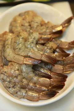 Raw jumbo shrimps Stock Photos