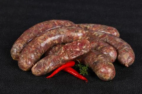 Raw lamb sausages Stock Photos