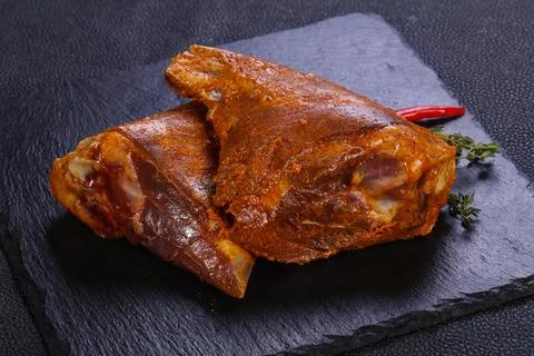 Raw lamb shank Stock Photos