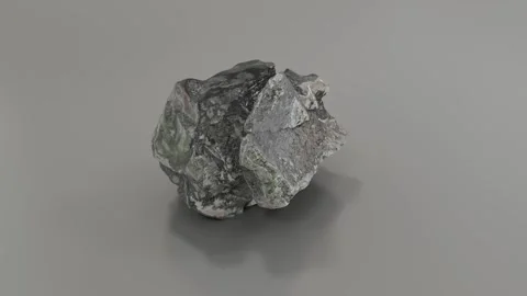 Raw lead mineral on plain surface, used in industry and construction Stock Footage 313018922