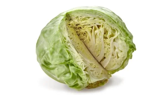 Raw, light green cabbage without one cut off piece. Isolated on white background Stock Photos