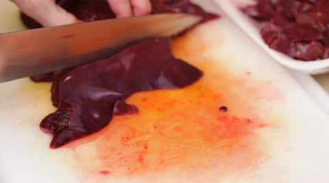 Raw liver chopping Stock Footage 35960469
