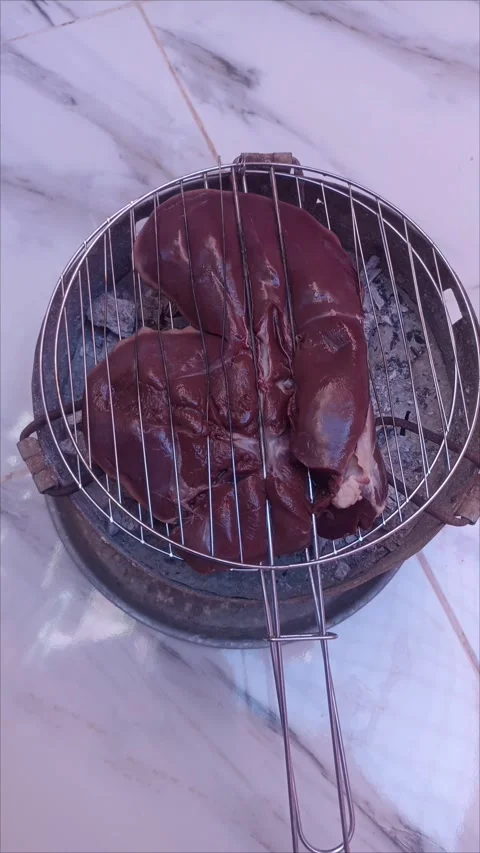 Raw Liver Grilling on Charcoal BBQ Clip Stock Footage 335783445