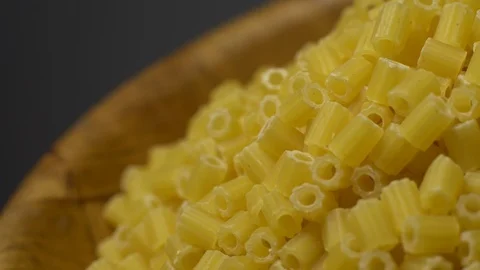 Raw macaroni in rotation. Ditalini lisci. Close up. Raw pasta. Video stock 101641104
