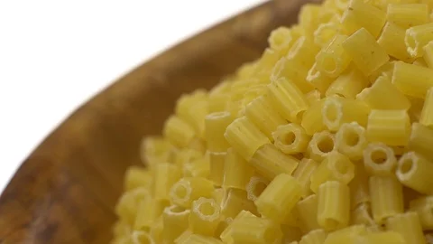 Raw macaroni in rotation. Ditalini lisci. Close up. Raw pasta. Video stock 101641204