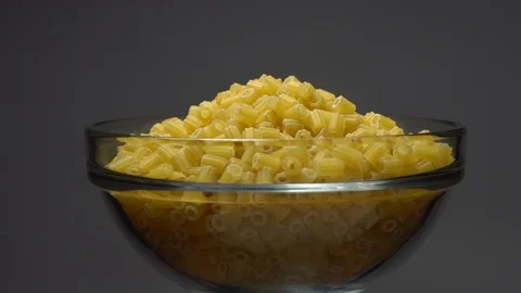 Raw macaroni in rotation. Ditalini lisci. Close up. Raw pasta. Video stock 101646424