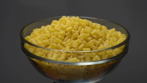 Raw macaroni in rotation. Ditalini lisci. Close up. Raw pasta. Video stock 101646441