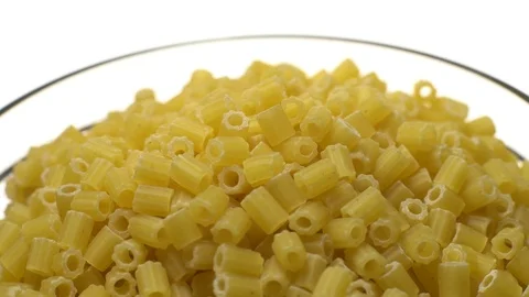 Raw macaroni in rotation. Ditalini lisci. Close up. Raw pasta. Video stock 101648209