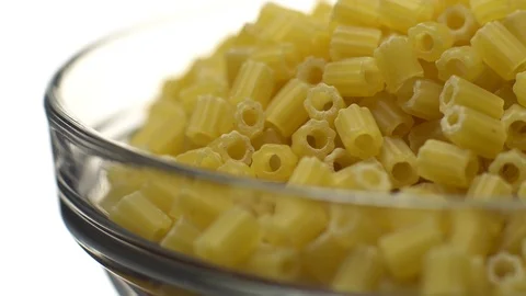 Raw macaroni in rotation. Ditalini lisci. Close up. Raw pasta. Video stock 101650797
