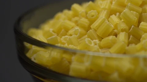 Raw macaroni in rotation. Ditalini lisci. Close up. Raw pasta. Video stock 101650934