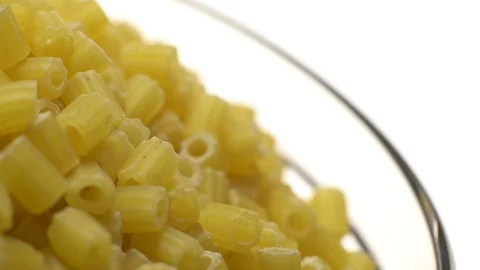 Raw macaroni in rotation. Ditalini lisci. Close up. Raw pasta. Video stock 101651213