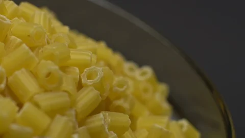 Raw macaroni in rotation. Ditalini lisci. Close up. Raw pasta. Stock Footage 101651238