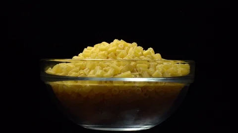 Raw macaroni in rotation. Ditalini lisci. Close up. Raw pasta. Stock Footage 101651307