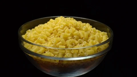 Raw macaroni in rotation. Ditalini lisci. Close up. Raw pasta. Video stock 101651738