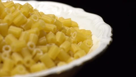 Raw macaroni in rotation. Ditalini lisci. Close up. Raw pasta. Stock Footage 101652067
